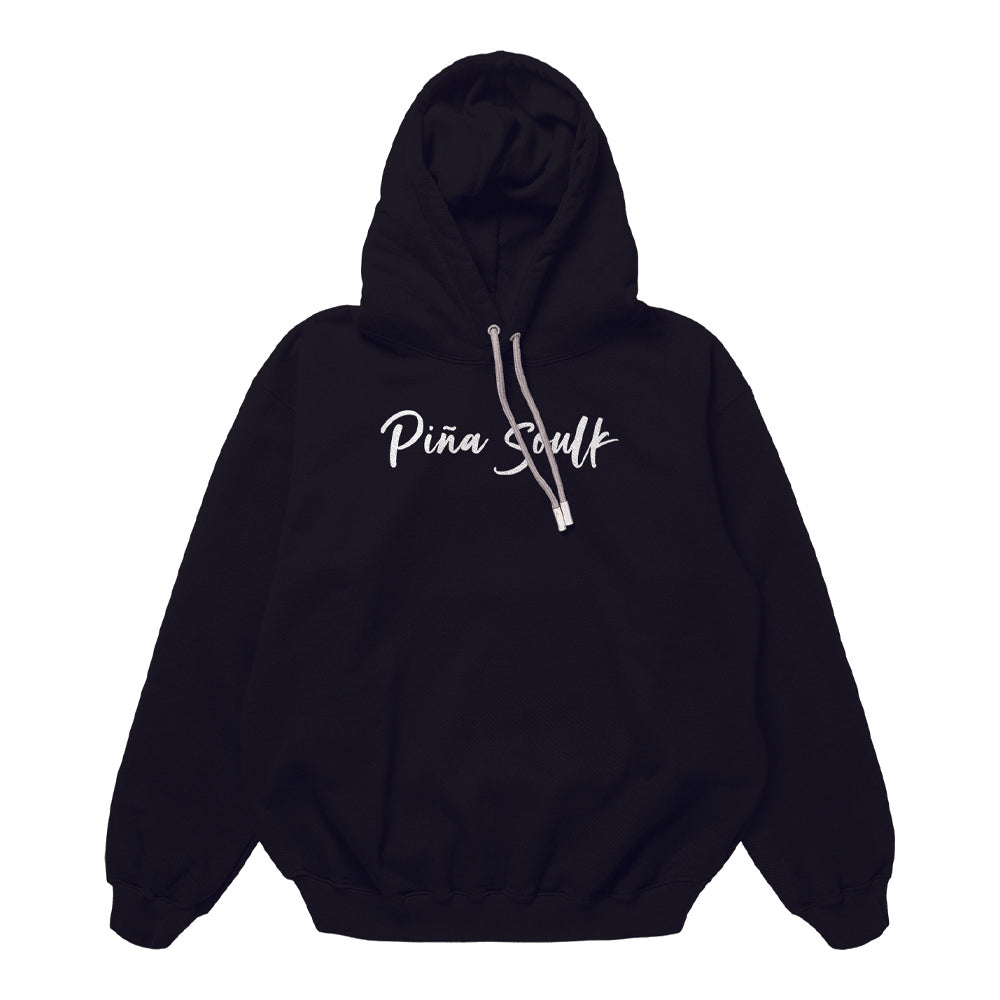 Hoodie frontal de Piña Soulk en color negro, diseñado para amantes del skate, ciclismo y surf con un estilo urbano y aventurero